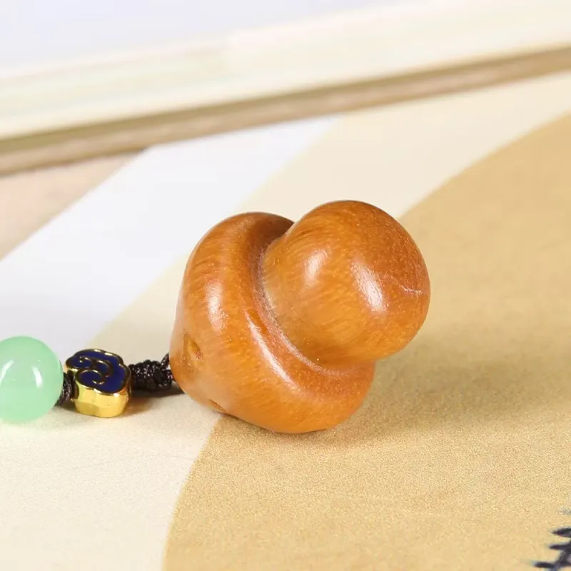 Is Here Sandalwood Cell Phone Pendant Unisex-3