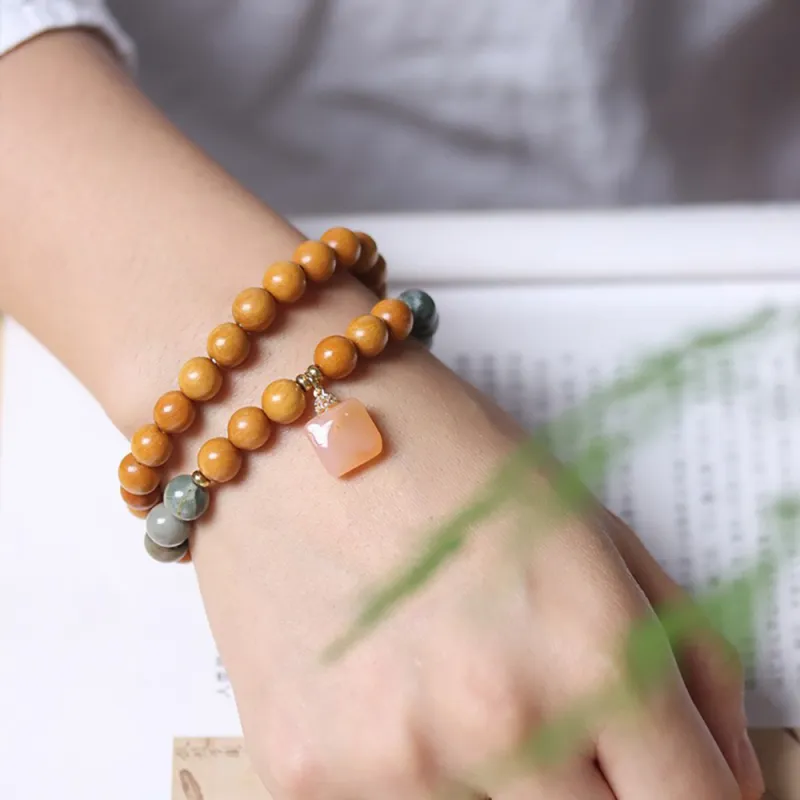Is Here Barbie Sandalwood Bracelets Unisex-4