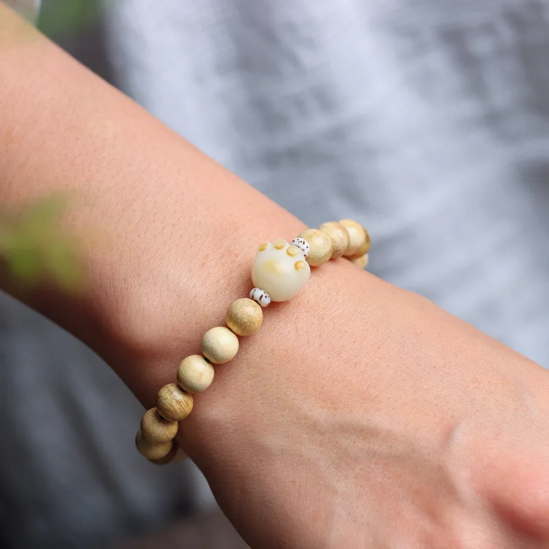 Is Here Milky Agarwood Bracelets Unisex-4