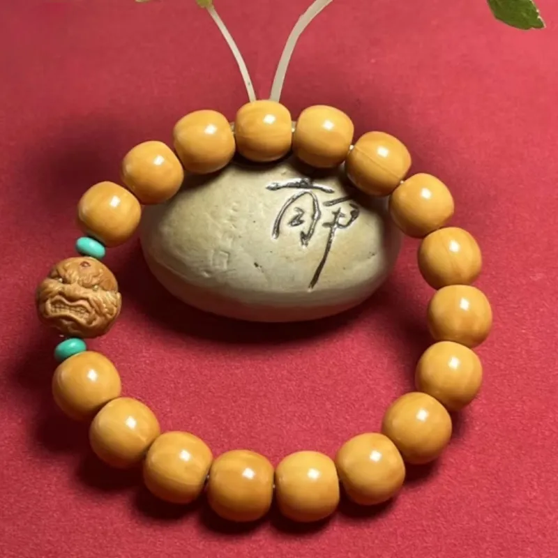 Ji Millennium Monkey Head Walnut Bracelets Unisex-1
