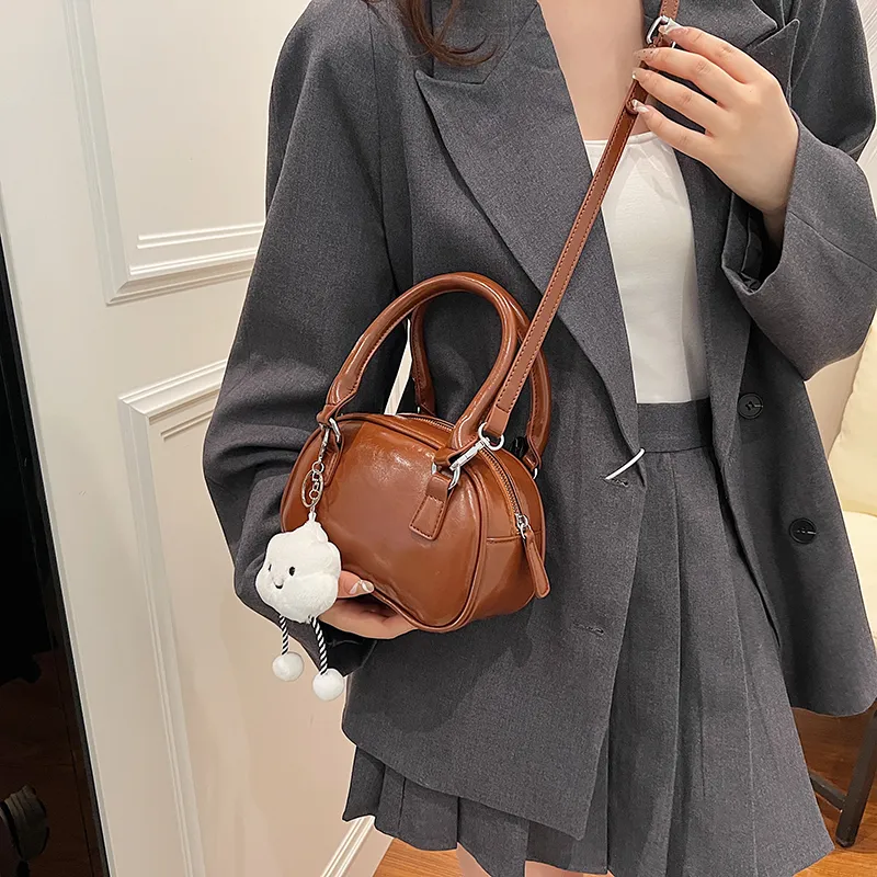 Iman's house Handbags-18