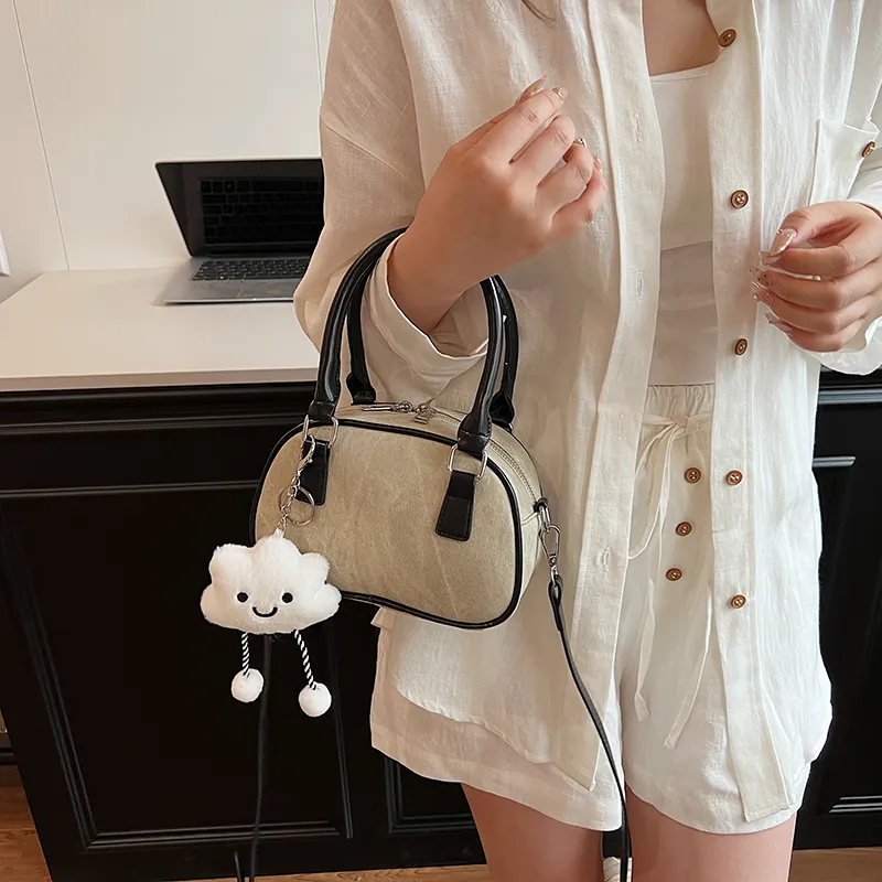 Iman's house Handbags-21