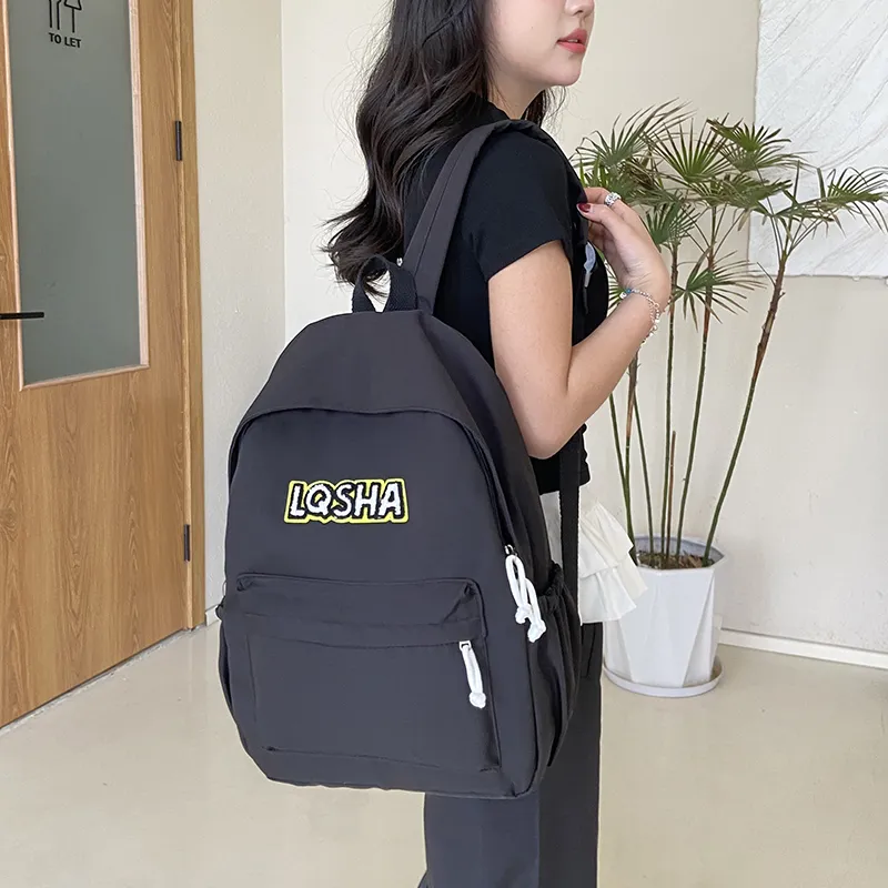 KAKAXI Nylon Backpack Unisex Black/White/Red/Yellow-1