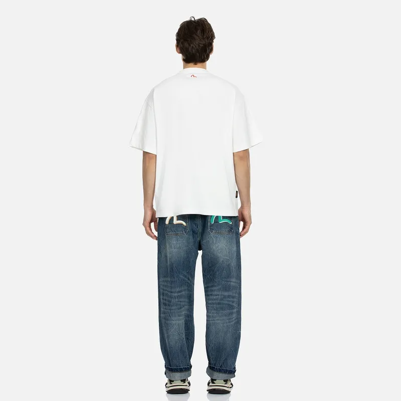 EVISU Slogan-print Tapered-leg Jeans-4