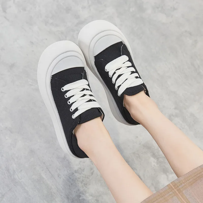 Little Red Man Low Top Skateboard Shoes Women's Black-1