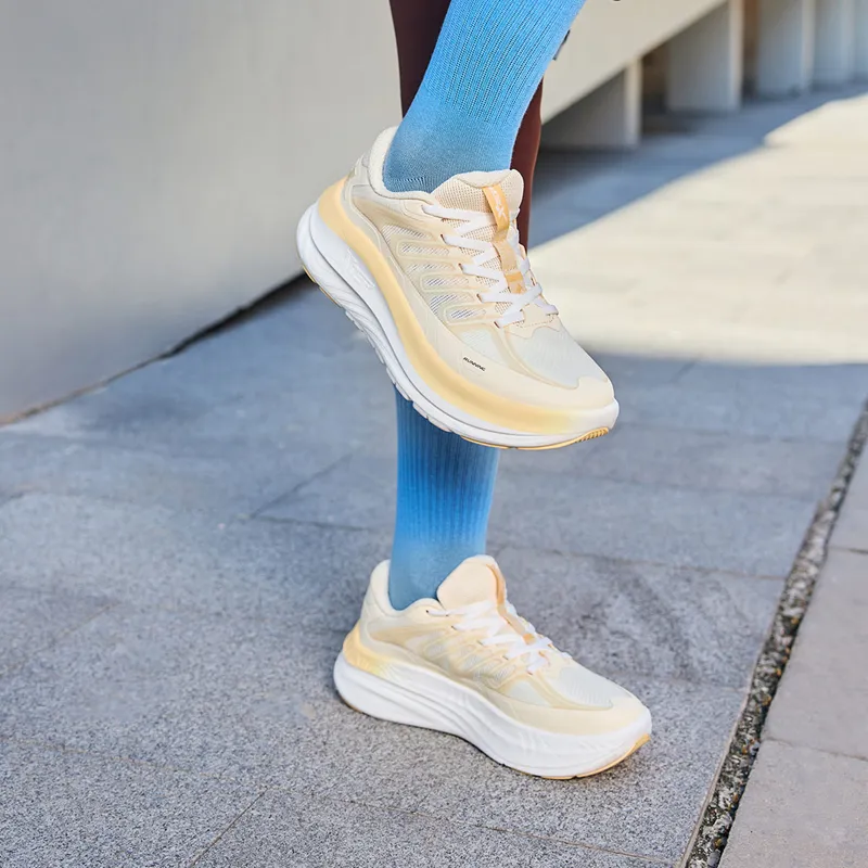 XTEP Abrasion Resistant Coverage Lightweight Low Top Running Shoes Women's Almond Yellow-7