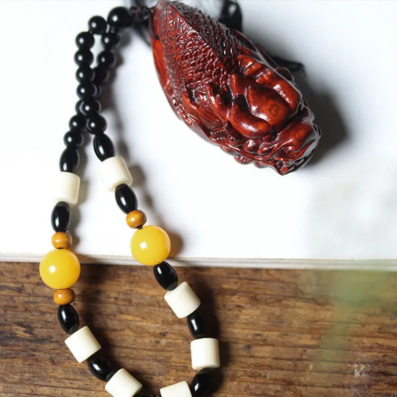 ANNYONNLLY Small Leaf Red Sandalwood Pendants Unisex-3