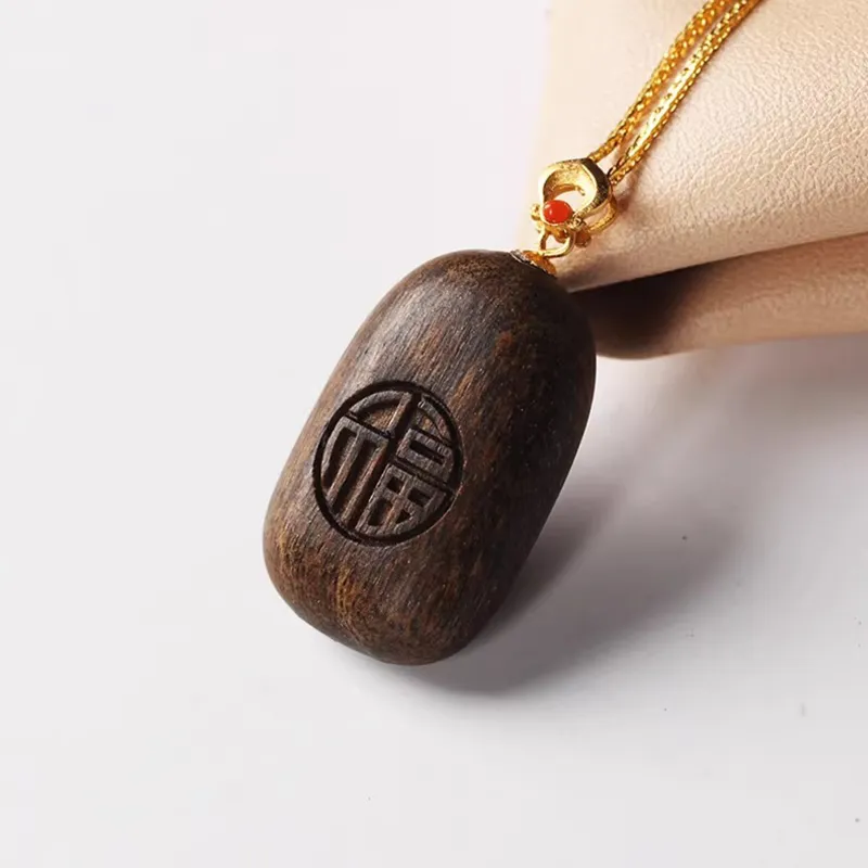 Tan Xin Sandalwood Necklaces Unisex-1