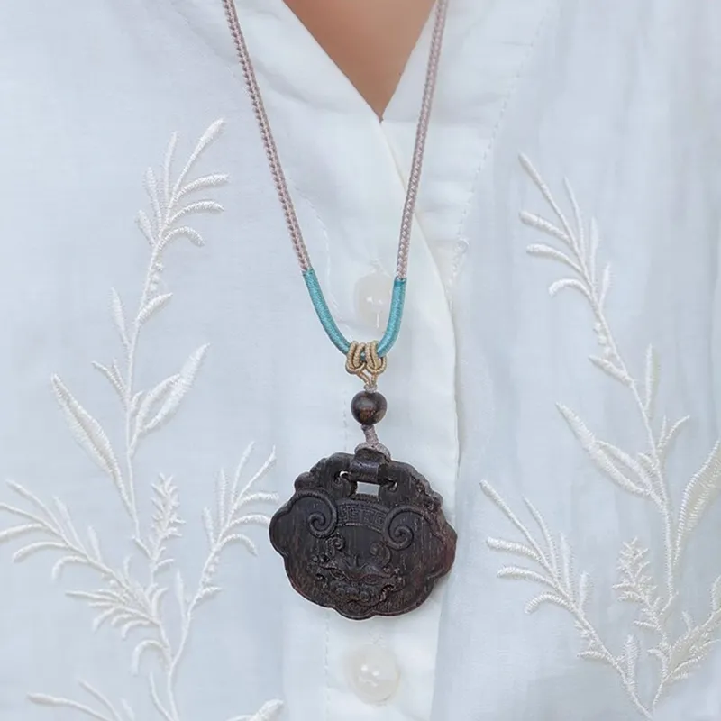 Tan Xin Sandalwood Necklaces Unisex-1