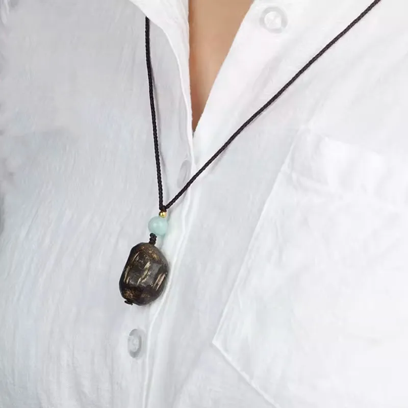 Tan Xin Sandalwood Necklaces Unisex-1