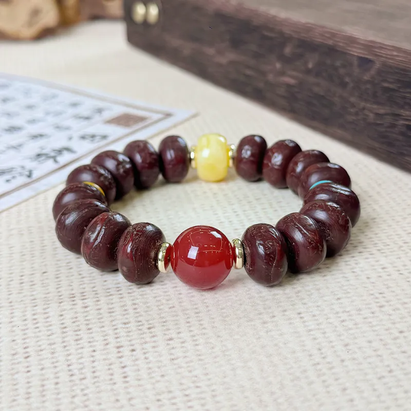 PUTUOSHANWENCHUANG Phoenix Eye Bodhi Seeds Bracelets Unisex-1