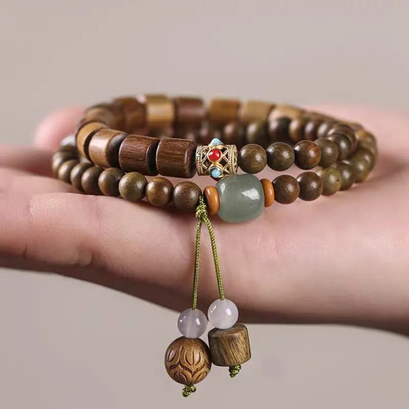 PUTUOSHANWENCHUANG Sandalwood Bracelets Unisex-1