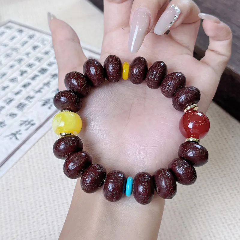 PUTUOSHANWENCHUANG Phoenix Eye Bodhi Seeds Bracelets Unisex-2
