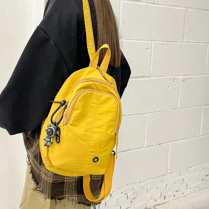 DCLOUD Nylon Backpack Unisex Egg Yolk Flowing Sand/Black/Ecru/Vanilla Cream-1