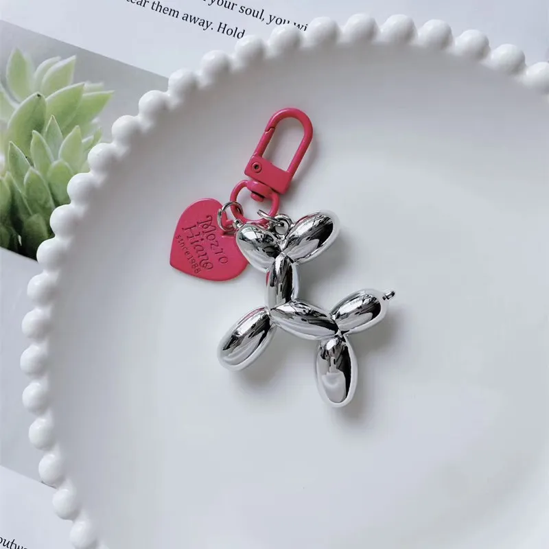 TBoML Keychains Unisex-3