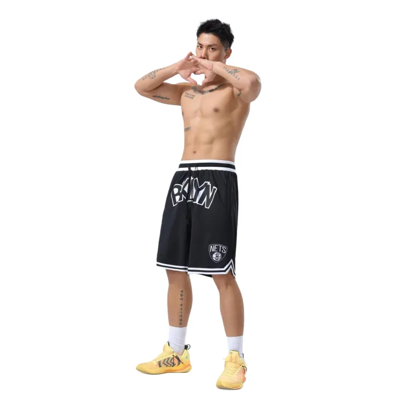 T IRA Sports Shorts Unisex-6