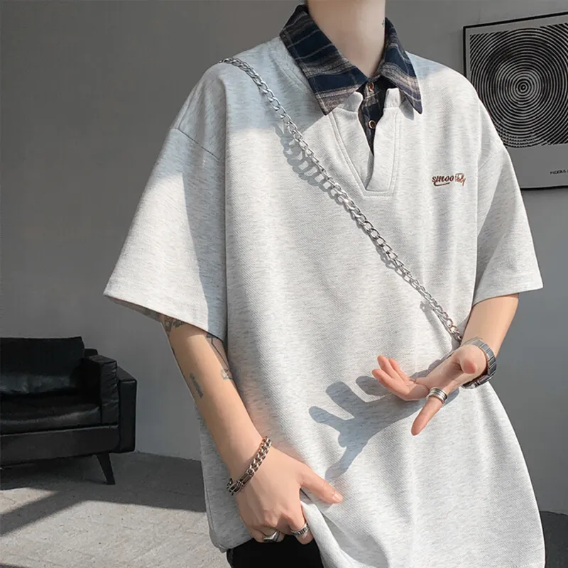 T IRA Short Sleeved Polo Shirt Unisex-1