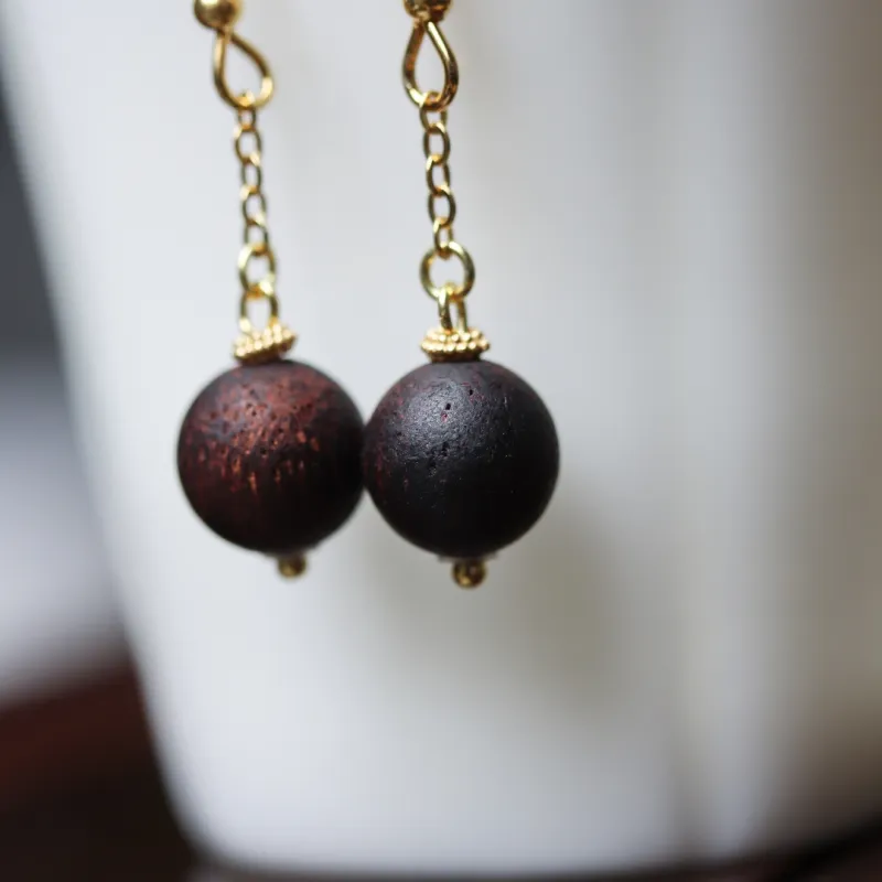 TIANTAISHAN Agarrattan Earrings Unisex-4