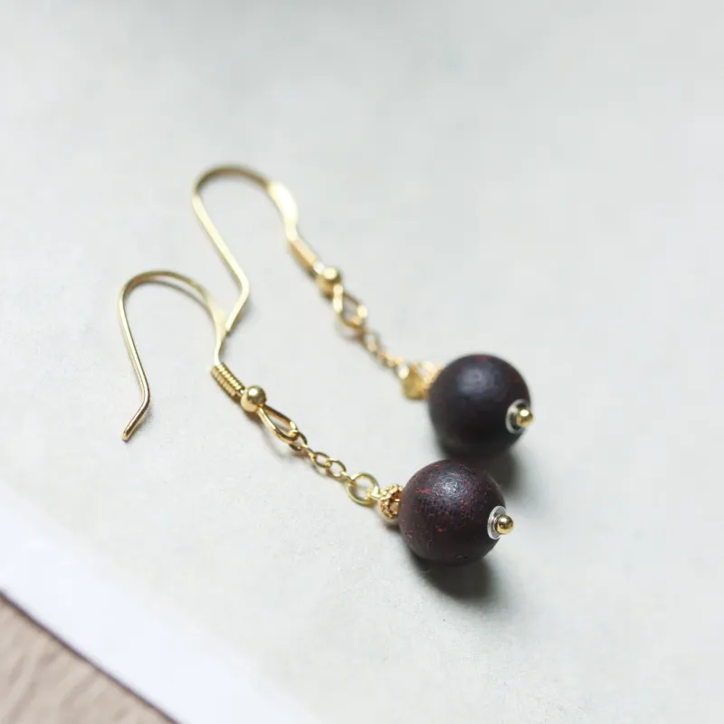 TIANTAISHAN Agarrattan Earrings Unisex-3
