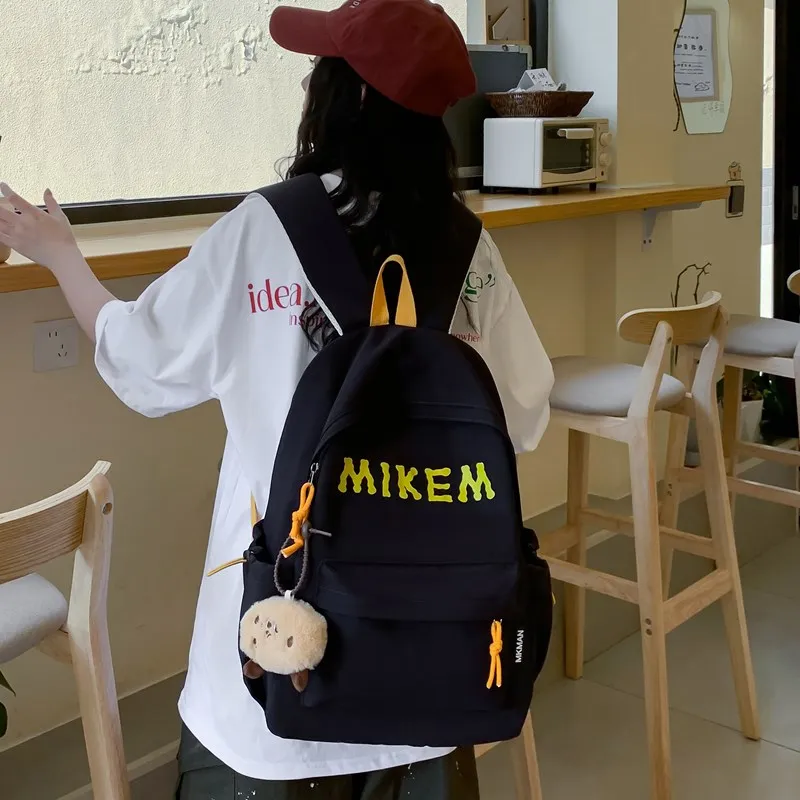 PULEWEI Composite Cloth Backpack Unisex Black/Red/Yellow/Blue-1
