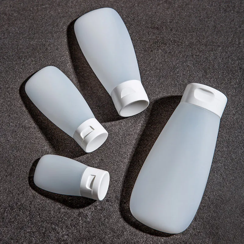 JIAOXUEFEI Portable Dosing Bottle Travel Soft Press Facial Cleanser Shower Gel Shampoo Bottle Set With Empty Bottles-1