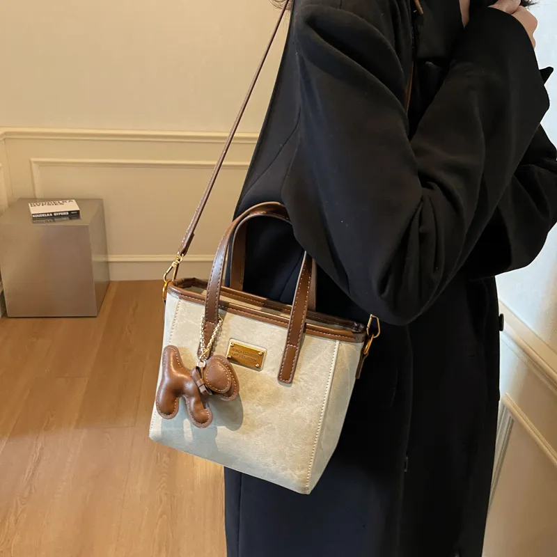 TOUTSEUL YOLO PU Crossbody One Shoulder Handbag Women's White & Black/White & Coffee/Black & Blue/Coffee-5