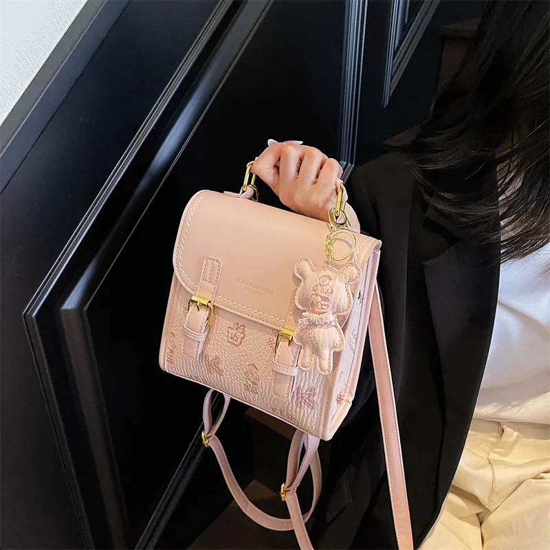 TOUTSEUL YOLO PU One Shoulder Crossbody Backpack Women's White/Black/Pink/Brown-14