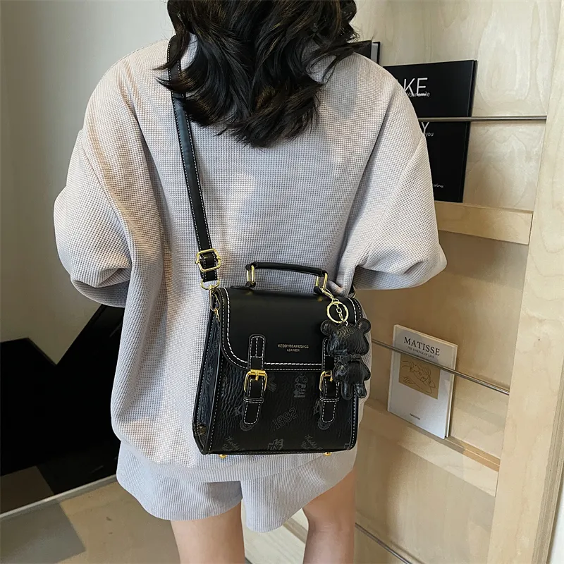 TOUTSEUL YOLO PU One Shoulder Crossbody Backpack Women's White/Black/Pink/Brown-7