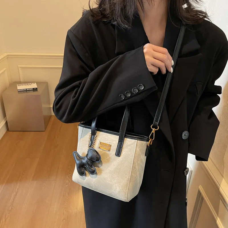 TOUTSEUL YOLO PU Crossbody One Shoulder Handbag Women's White & Black/White & Coffee/Black & Blue/Coffee-1