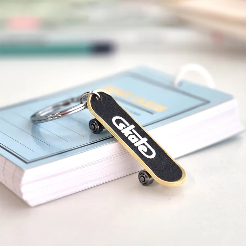 Meta[l]morphose BIG In Miniature Alloy Keychains Unisex-1