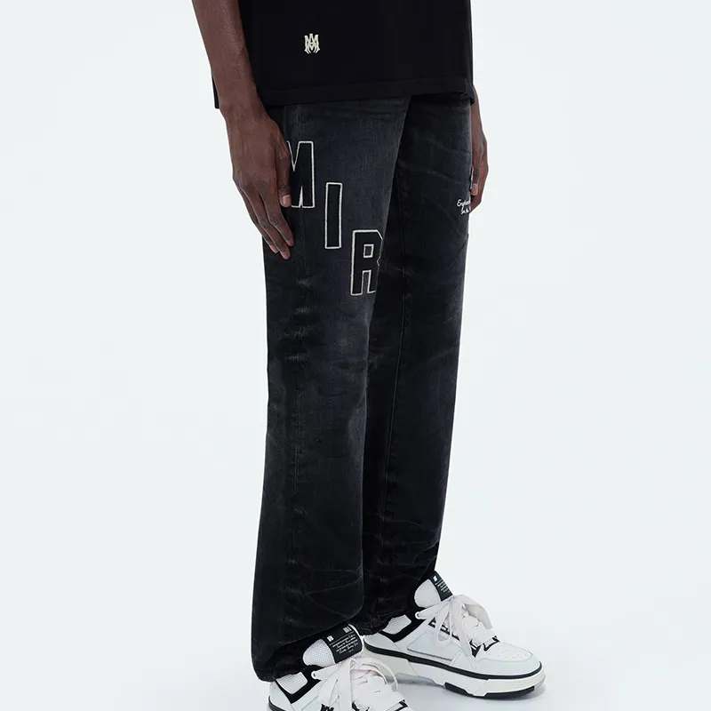 AMIRI Logo patch Distressed Jeans-5