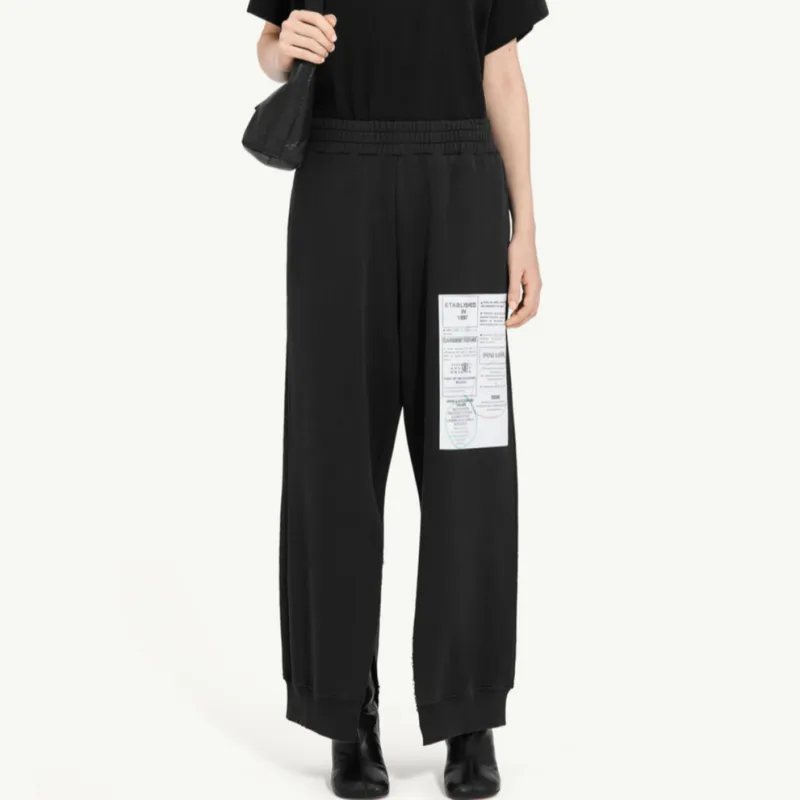 MM6 Maison Margiela Numbers Patch Flared Trousers-1