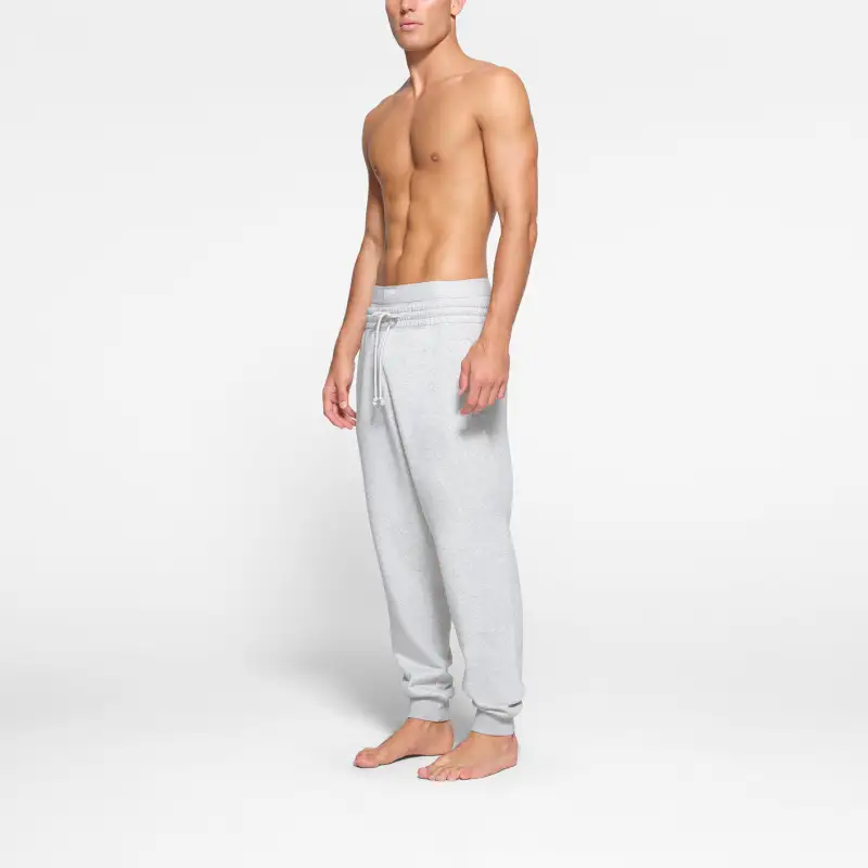 SKIMS FLEECE LOUNGE MENS TAPERED JOGGER Casual Pants Men's Light Heather Grey-1