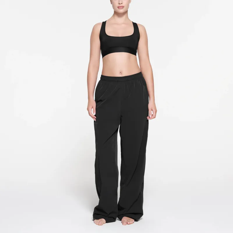 SKIMS TRACK WOVEN NYLON PANT Casual Pants Women's ONYX/Onyx-1