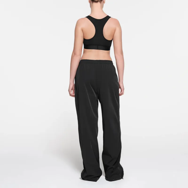 SKIMS TRACK WOVEN NYLON PANT Casual Pants Women's ONYX/Onyx-2