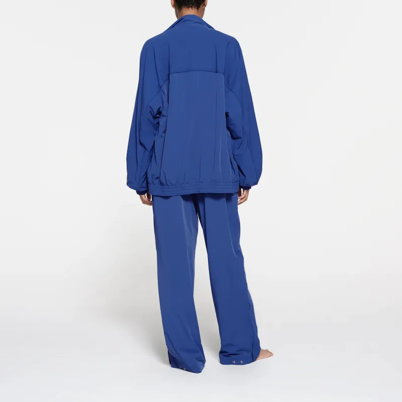 SKIMS TRACK WOVEN NYLON OVERSIZED JACKET Jackets Coats Women's COBALT/Cobalt Blue-2