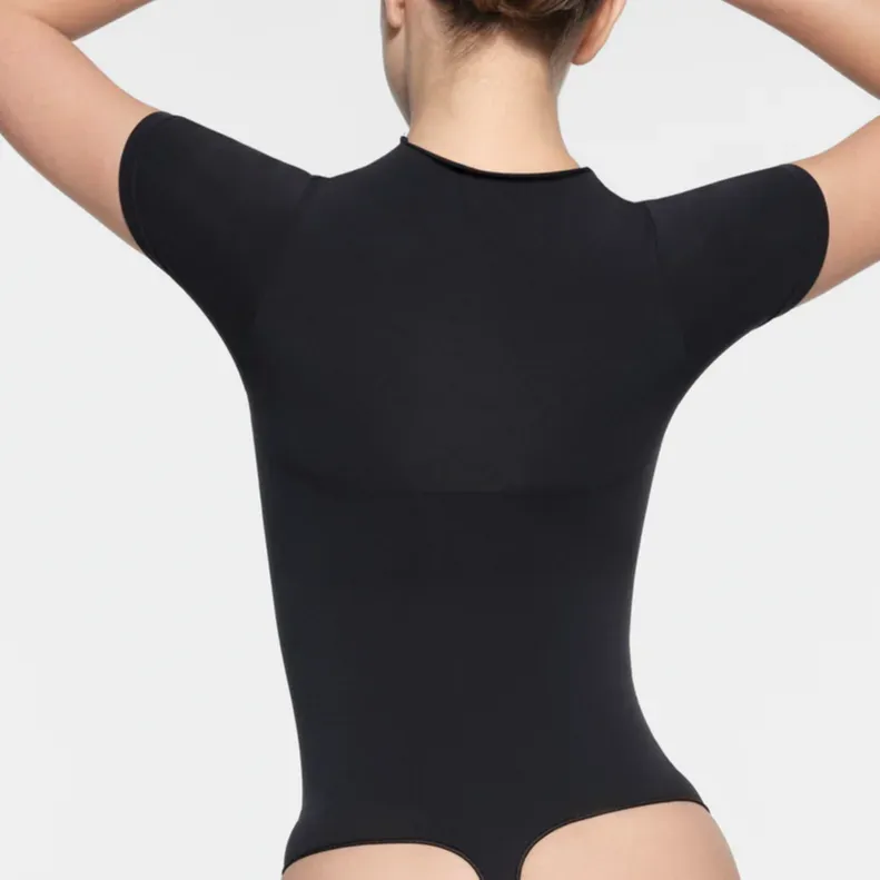 SKIMS SEAMLESS SCULPT ZIP FRONT T-SHIRT THONG BODYSUIT Bodysuits Women's ONYX/Onyx-2