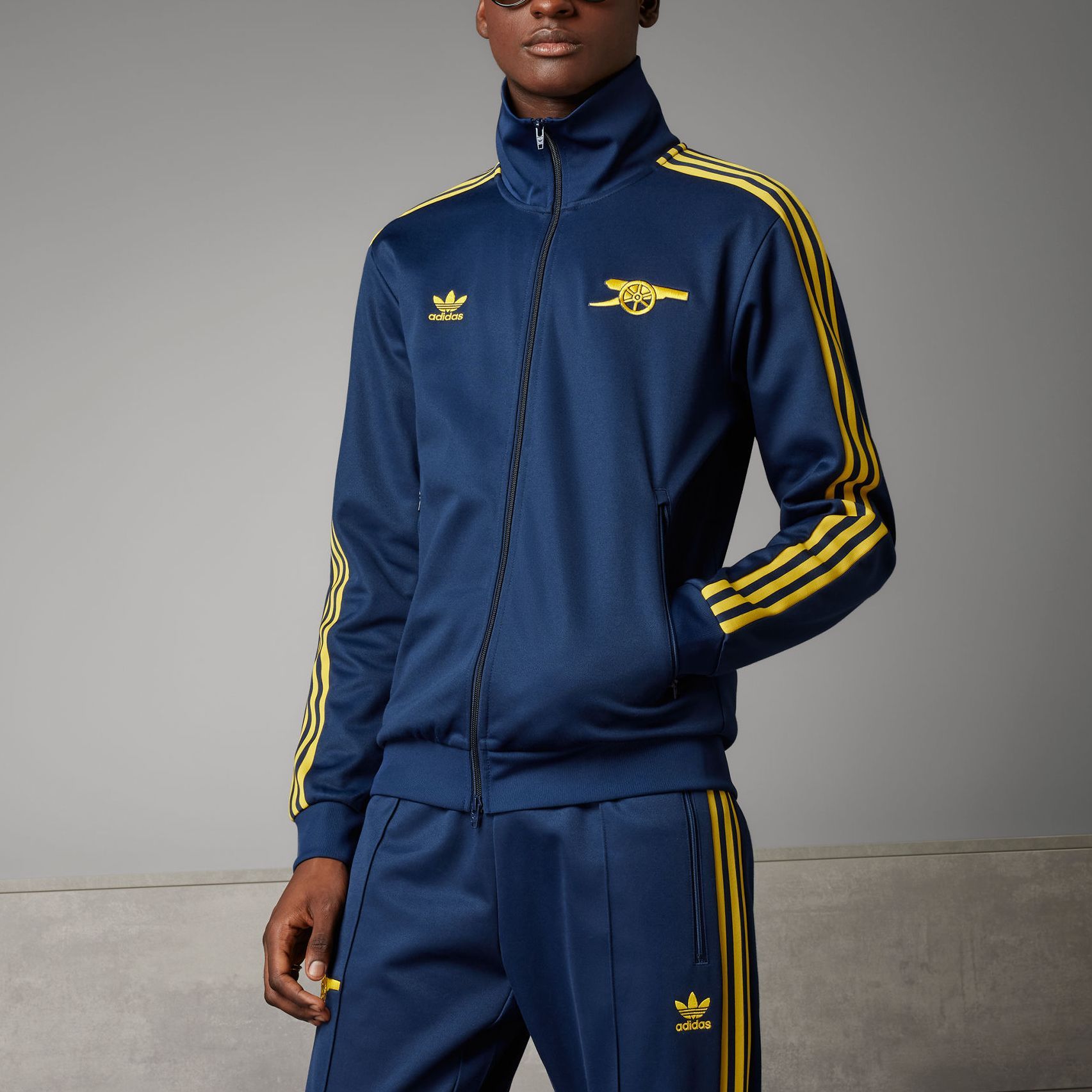 navy blue and yellow adidas tracksuit