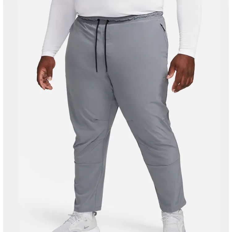 Nike Unlimited Men's Dri FIT Tapered Leg Versatile Pants-4