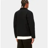 She added a gray hoodie over the bra top to comply with the airline