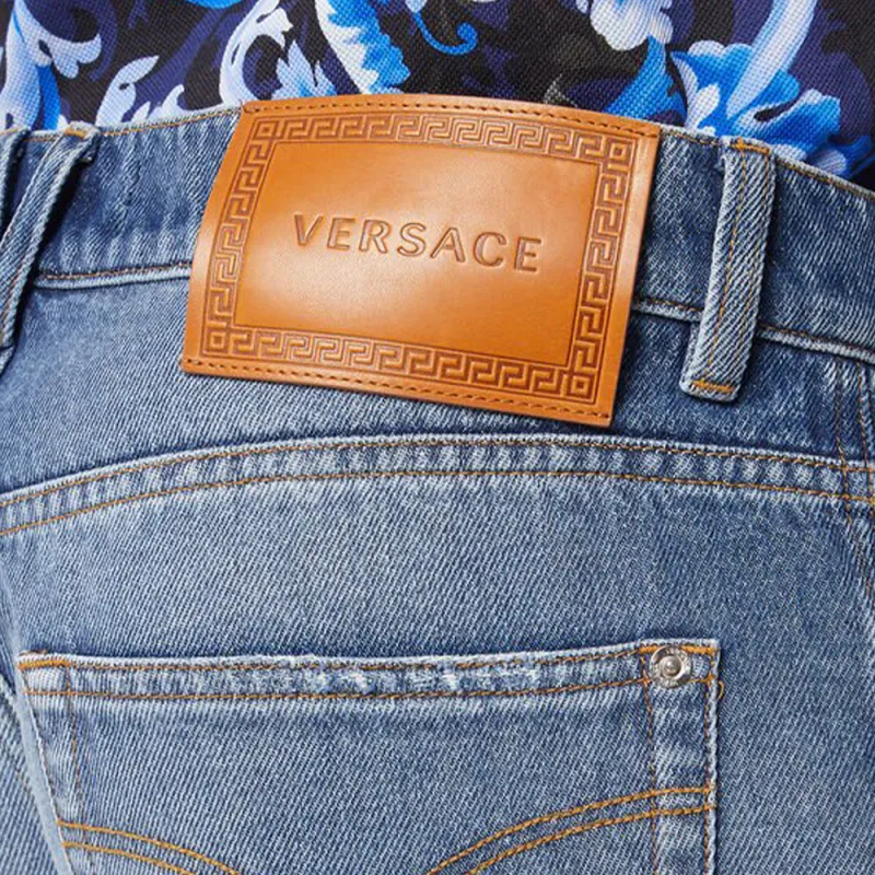 VERSACE Logo Patch Distressed Denim Jeans-4